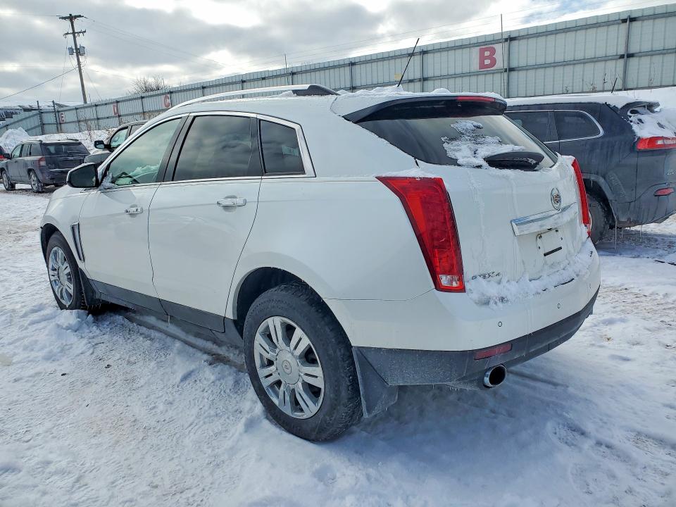 Photo 2 from auction – 2015 CADILLAC SRX LUXURY with VIN 3GYFNEE39FS558095