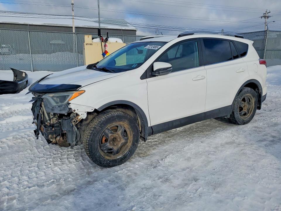 TOYOTA RAV4 LE 2016 with VIN 2T3BFREVXGW409063 - Photo from auction