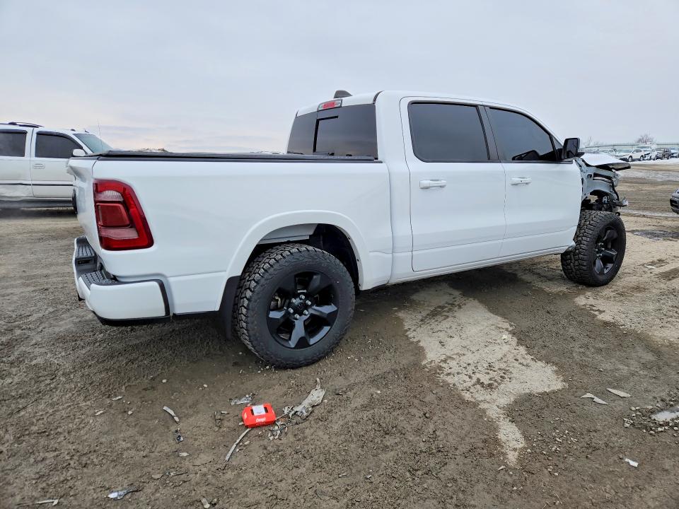 Photo 3 from auction – 2021 RAM 1500 with VIN 1C6SRFJT6MN735978