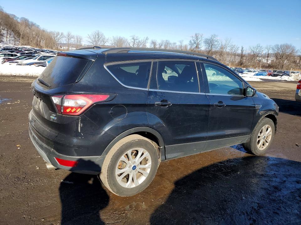 Photo 3 from auction – 2018 FORD ESCAPE with VIN 1FMCU9GD6JUA73992
