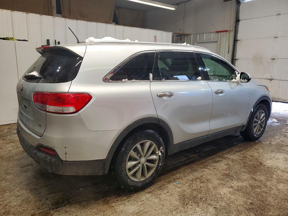 Photo 3 from auction – 2016 KIA SORENTO LX with VIN 5XYPGDA36GG166408