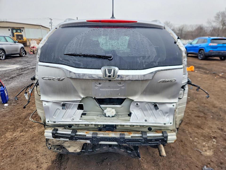 Photo 6 from auction – 2016 HONDA CR-V with VIN 2HKRM4H77GH600466