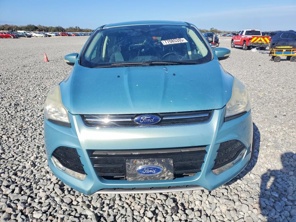 Photo 5 from auction – 2013 FORD ESCAPE with VIN 1FMCU9HX5DUB59520