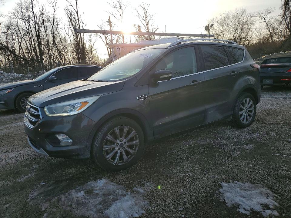 FORD ESCAPE 2017 with VIN 1FMCU9JDXHUE33011 - Photo from auction