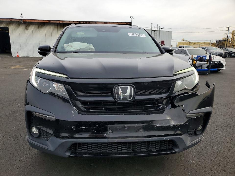 Photo 5 from auction – 2021 HONDA PILOT with VIN 5FNYF5H28MB043660