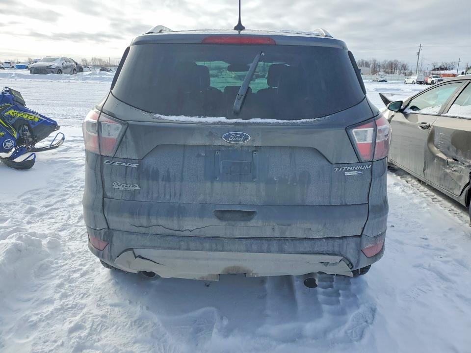Photo 6 from auction – 2018 FORD ESCAPE with VIN 1FMCU9J90JUA38143