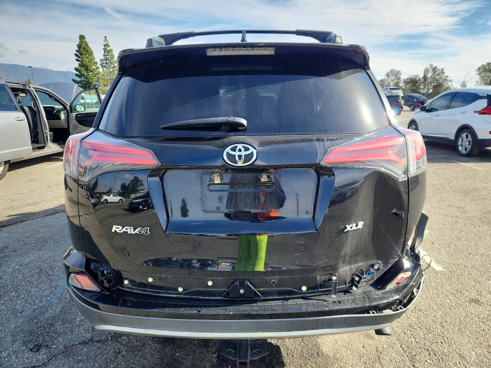 Photo 6 from auction – 2018 TOYOTA RAV4 with VIN 2T3WFREV3JW438350