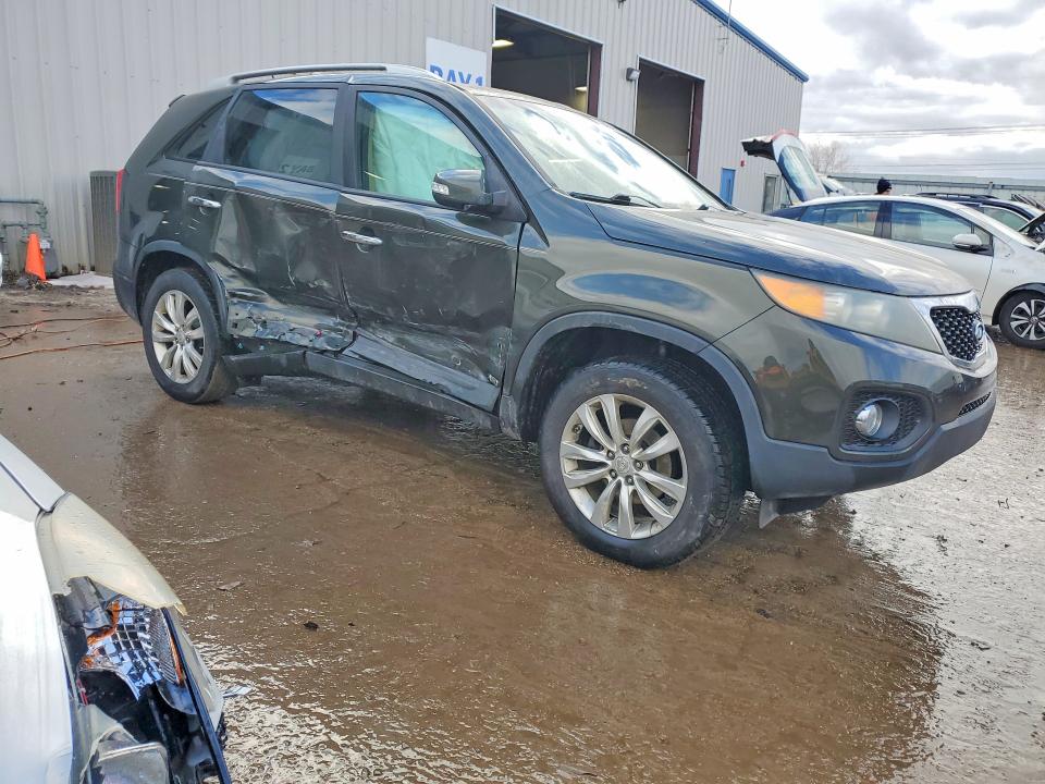Photo 4 from auction – 2011 KIA SORENTO with VIN 5XYKUDA11BG132497