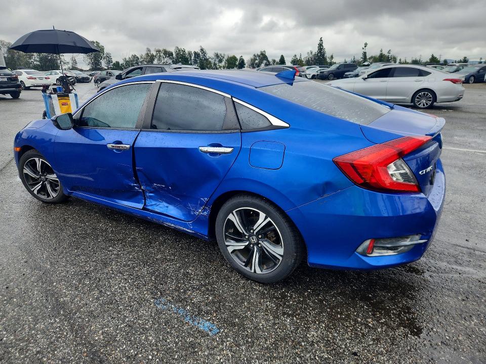 Photo 2 from auction – 2016 HONDA CIVIC with VIN 2HGFC1F93GH643205