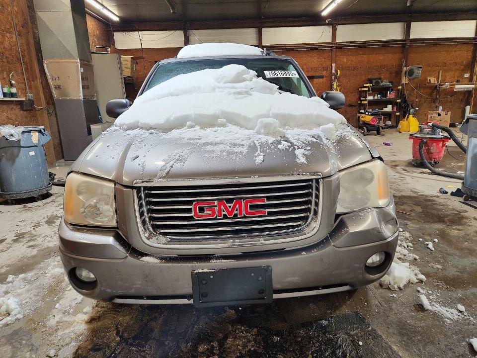 Photo 5 from auction – 2006 GMC ENVOY with VIN 1GKDT13S062246379