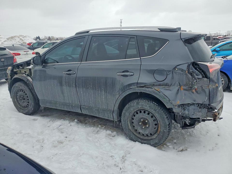 Photo 2 from auction – 2018 TOYOTA RAV4 LE with VIN 2T3ZFREV7JW499696