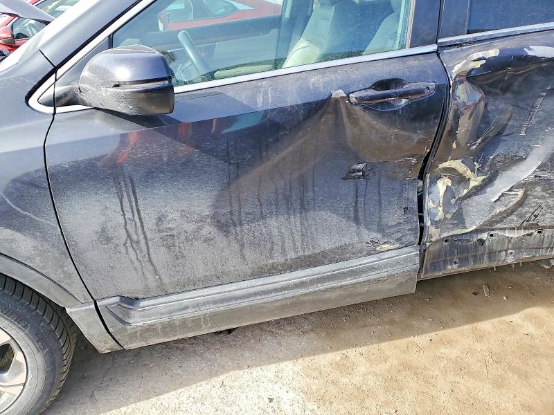 Photo 7 from auction – 2019 HONDA CR-V with VIN 5J6RW1H80KA029902