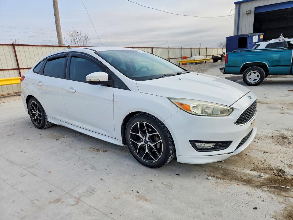 Photo 4 from auction – 2016 FORD FOCUS with VIN 1FADP3F23GL245283