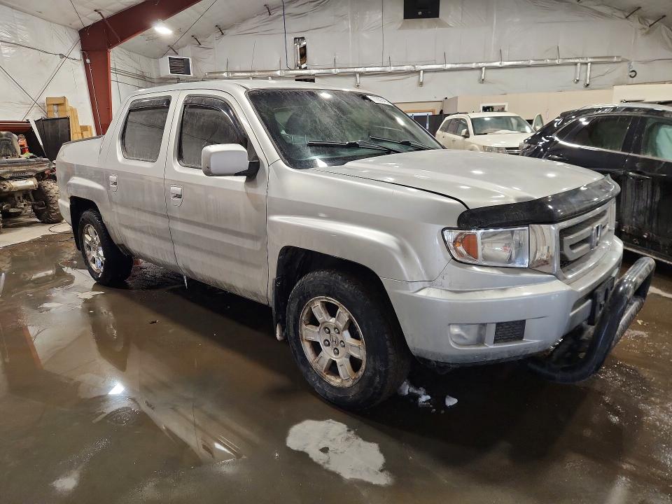 Photo 4 from auction – 2011 HONDA RIDGELINE with VIN 5FPYK1F43BB451321