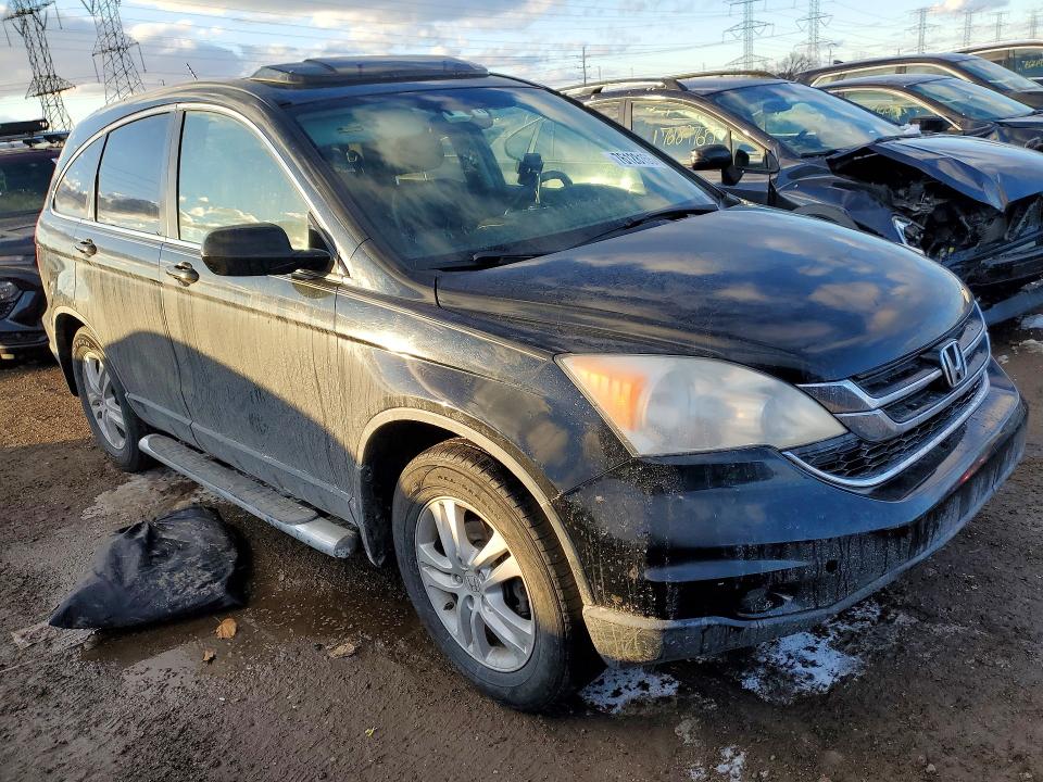 Photo 4 from auction – 2011 HONDA CR-V with VIN JHLRE3H76BC003582