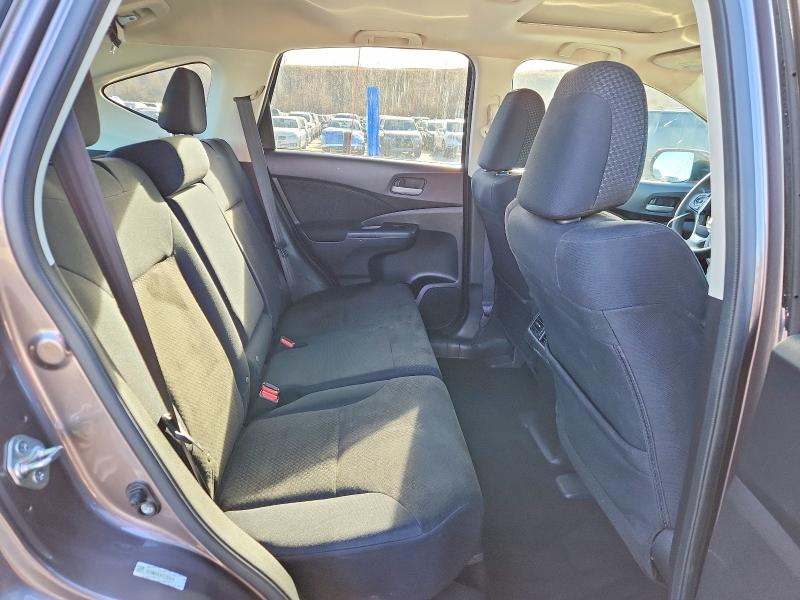 Photo 11 from auction – 2015 HONDA CR-V with VIN 3CZRM3H50FG703478