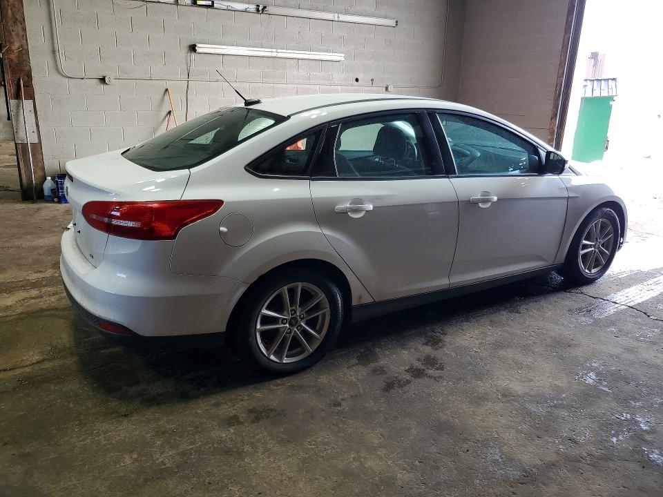 Photo 3 from auction – 2015 FORD FOCUS with VIN 1FADP3F22FL383458