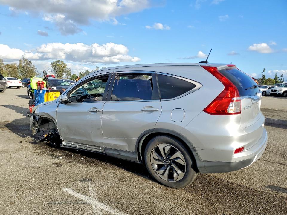 Photo 2 from auction – 2015 HONDA CR-V with VIN 5J6RM3H98FL018327