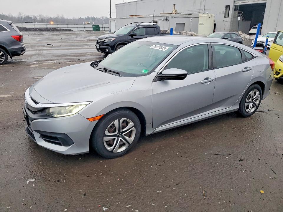 HONDA CIVIC 2016 with VIN 19XFC2F54GE033634 - Photo from auction
