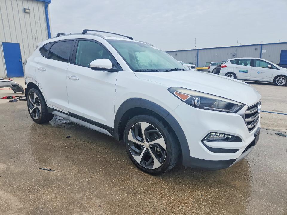 Photo 4 from auction – 2017 HYUNDAI TUCSON with VIN KM8J33A25HU515752