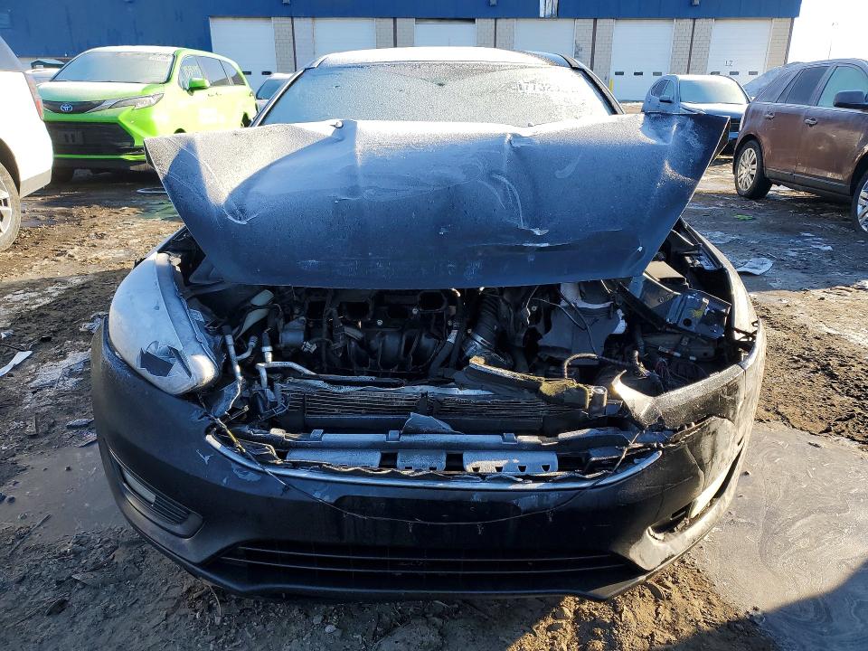 Photo 5 from auction – 2015 FORD FOCUS with VIN 1FADP3F22FL264678