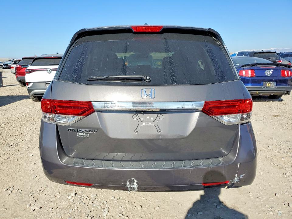 Photo 6 from auction – 2014 HONDA ODYSSEY with VIN 5FNRL5H64EB012990