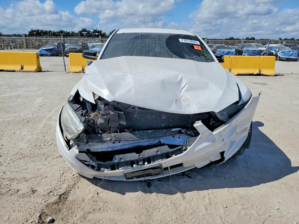 Photo 5 from auction – 2014 FORD TAURUS POL with VIN 1FAHP2MT9EG120012