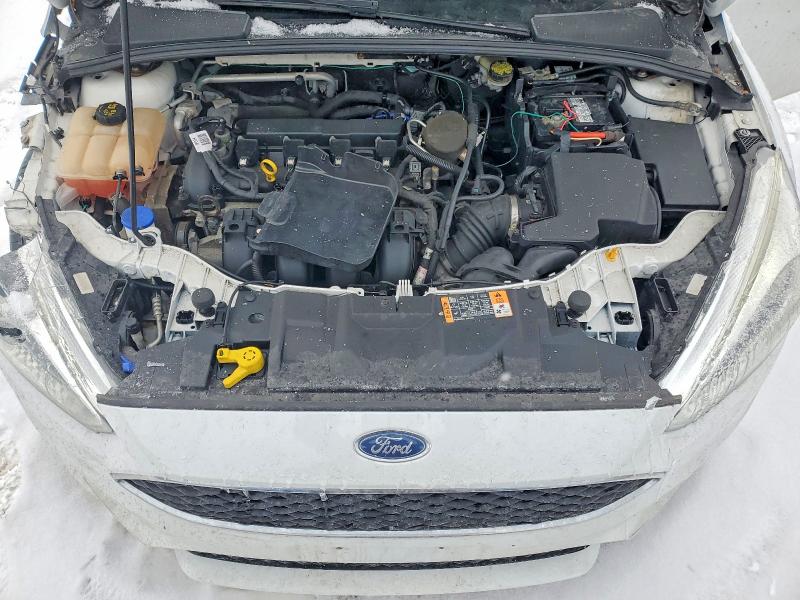 Photo 11 from auction – 2016 FORD FOCUS with VIN 1FADP3F27GL272969