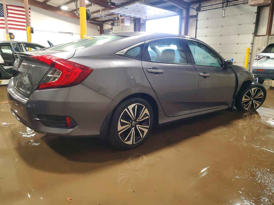 Photo 3 from auction – 2016 HONDA CIVIC with VIN 2HGFC1F30GH646994