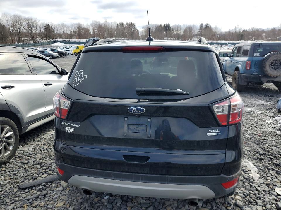 Photo 6 from auction – 2018 FORD ESCAPE with VIN 1FMCU9HD6JUC99576