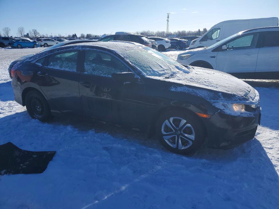 Photo 4 from auction – 2018 HONDA CIVIC LX with VIN 2HGFC2F50JH000658