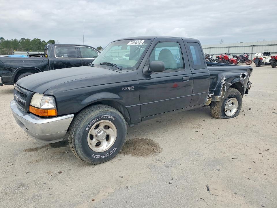 FORD RANGER 1999 with VIN 1FTYR14V6XPC06123 - Photo from auction
