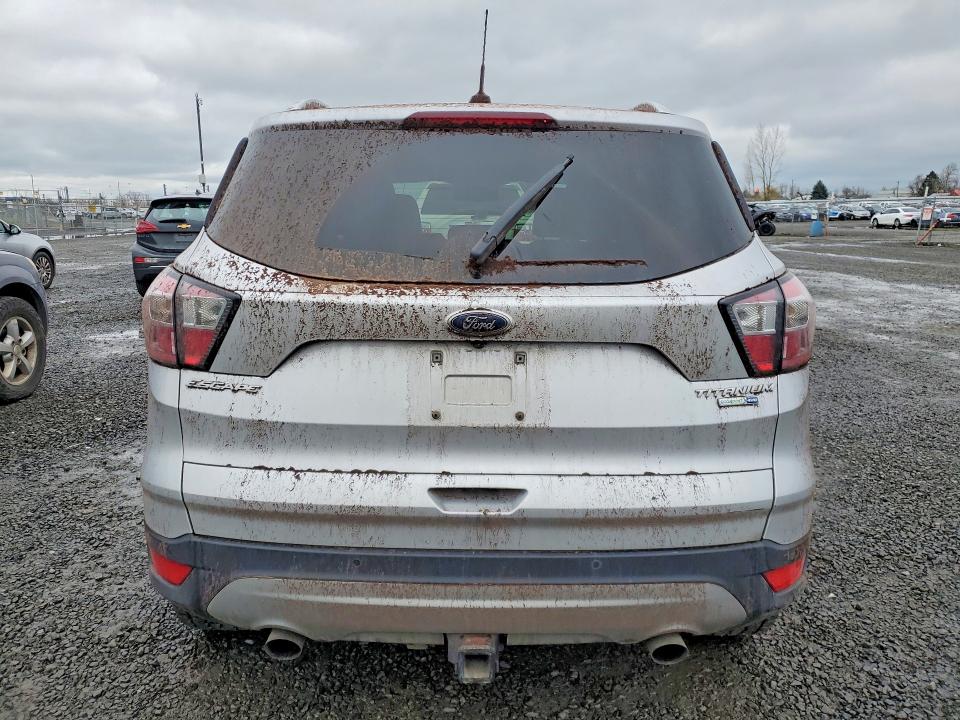 Photo 6 from auction – 2017 FORD ESCAPE with VIN 1FMCU9J97HUC02854