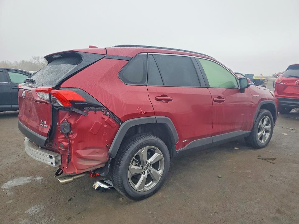 Photo 3 from auction – 2021 TOYOTA RAV4 XLE P with VIN JTMB6RFV5MD013050
