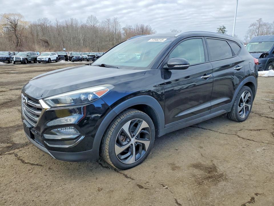 HYUNDAI TUCSON 2016 with VIN KM8J3CA27GU161134 - Photo from auction