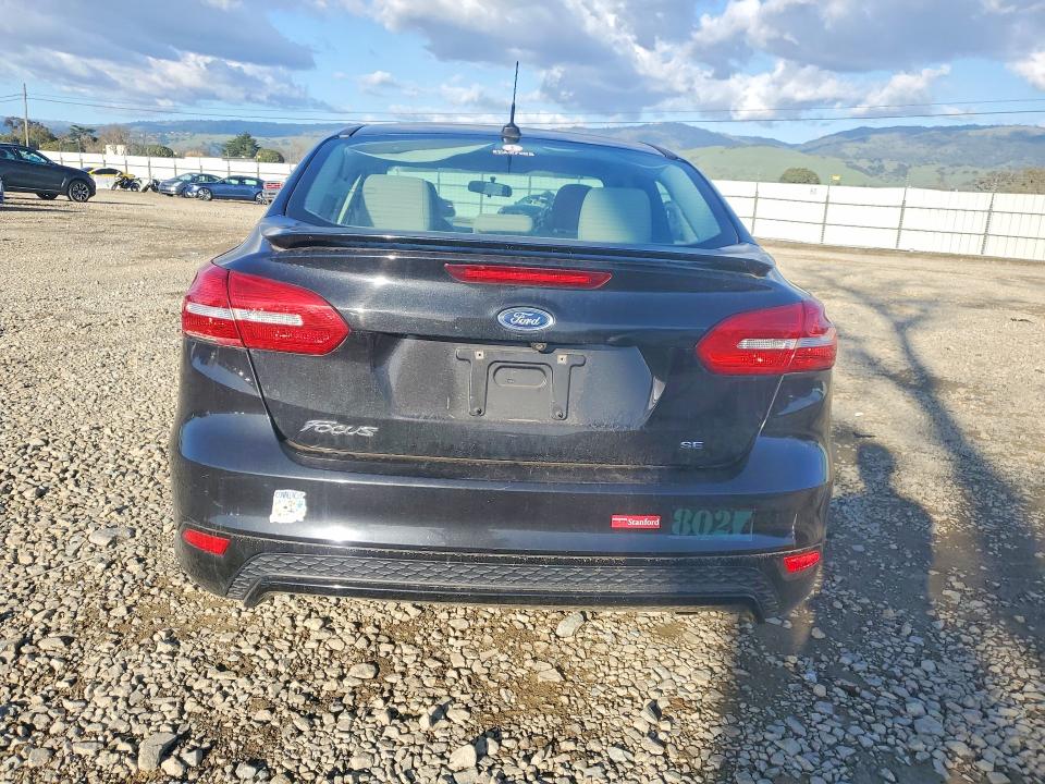 Photo 6 from auction – 2015 FORD FOCUS with VIN 1FADP3F23FL310535
