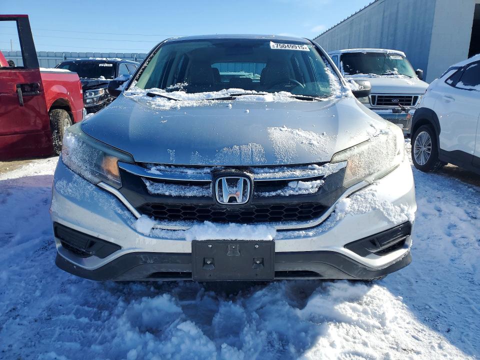 Photo 5 from auction – 2016 HONDA CR-V LX with VIN 5J6RM4H31GL012615