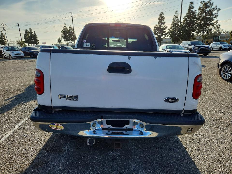 Photo 6 from auction – 2002 FORD F150 with VIN 1FTRW07LX2KE41986