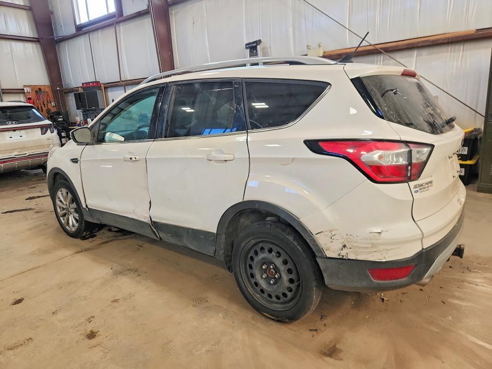 Photo 2 from auction – 2018 FORD ESCAPE TIT with VIN 1FMCU9J96JUA67856