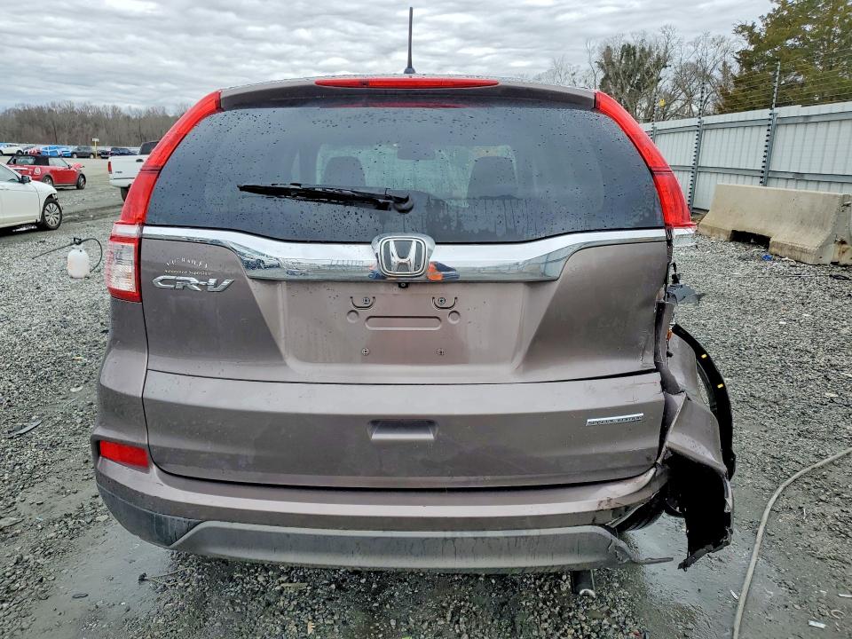 Photo 6 from auction – 2016 HONDA CR-V SE with VIN 2HKRM3H40GH541776