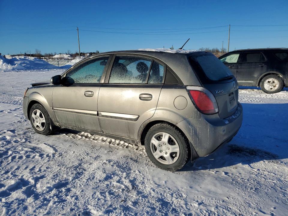 Photo 2 from auction – 2011 KIA RIO BASE with VIN KNADH5B33B6747863