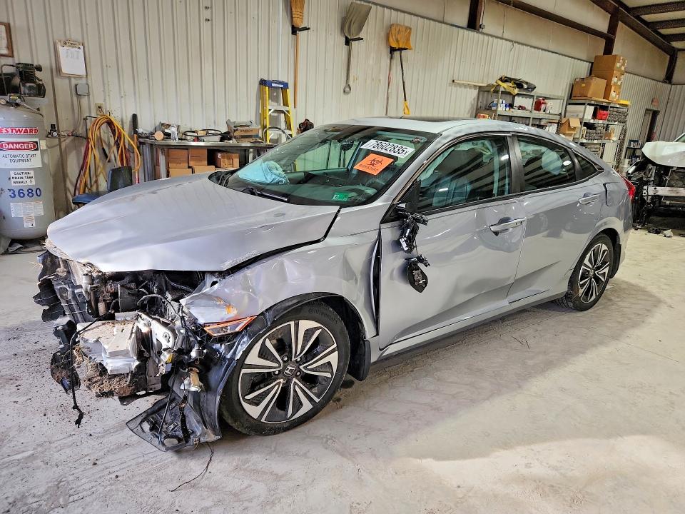 HONDA CIVIC 2017 with VIN 2HGFC1F75HH645182 - Photo from auction