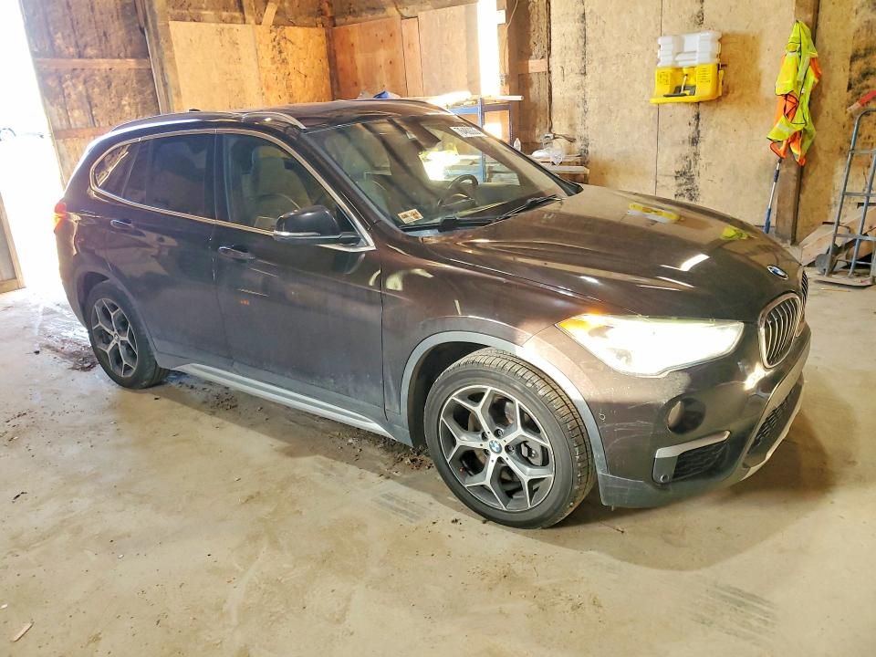 Photo 4 from auction – 2016 BMW X1 with VIN WBXHT3C33G5E48799