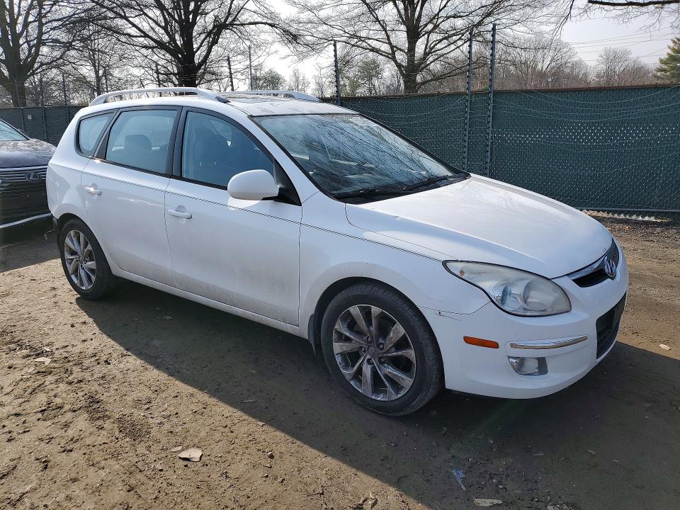 Photo 4 from auction – 2012 HYUNDAI ELANTRA with VIN KMHDC8AE3CU144989