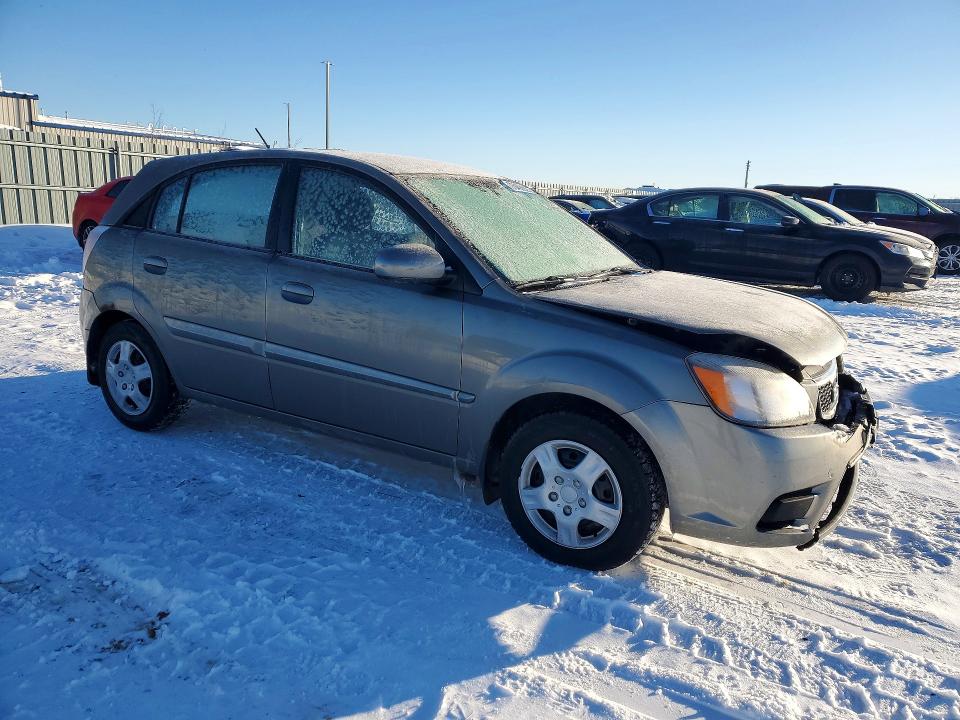 Photo 4 from auction – 2011 KIA RIO BASE with VIN KNADH5B33B6747863