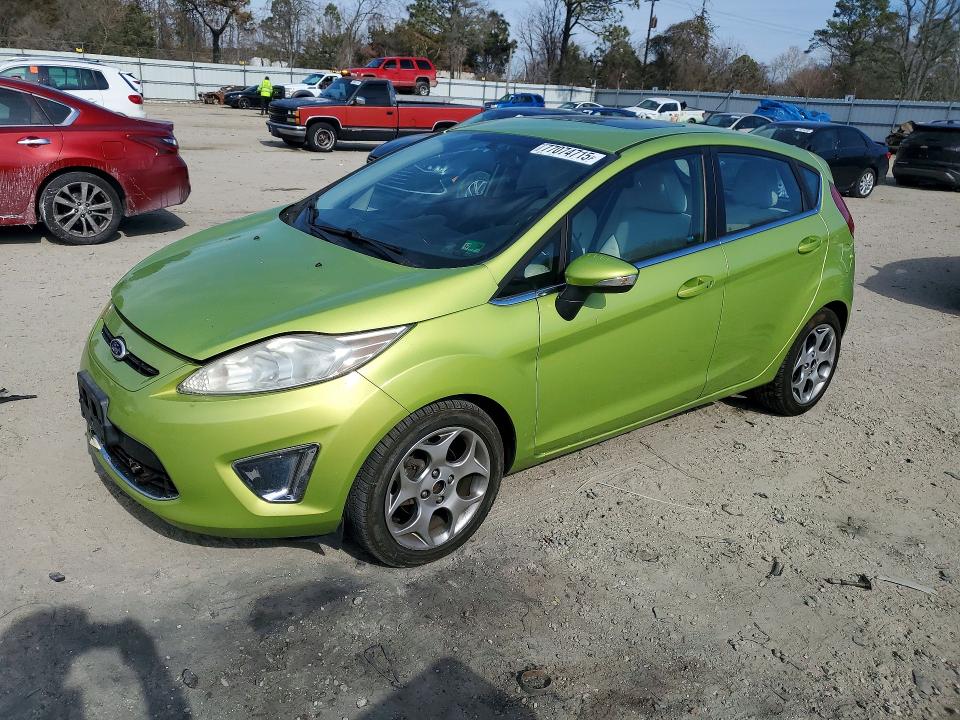 FORD FIESTA SES 2011 with VIN 3FADP4FJ2BM113524 - Photo from auction