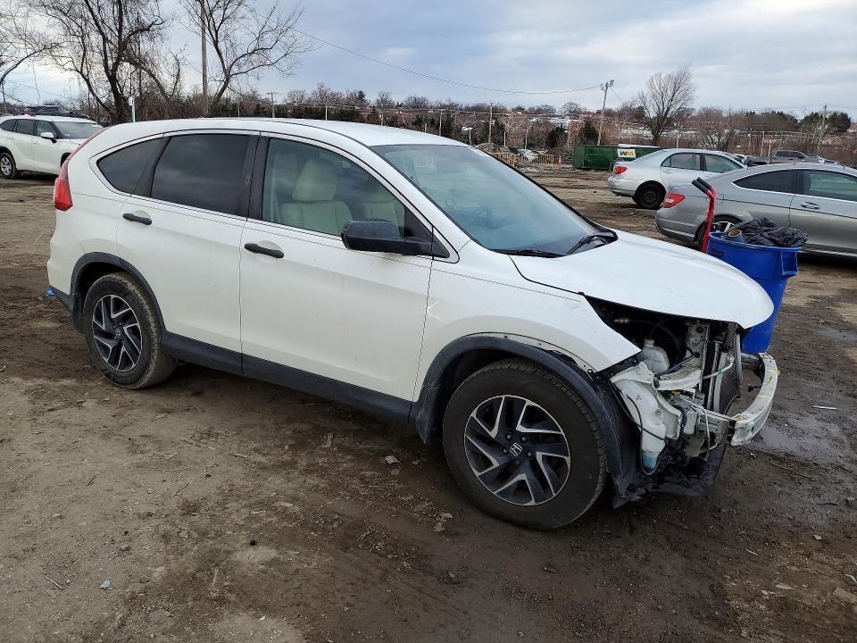 Photo 4 from auction – 2016 HONDA CR-V with VIN 5J6RM3H44GL008559