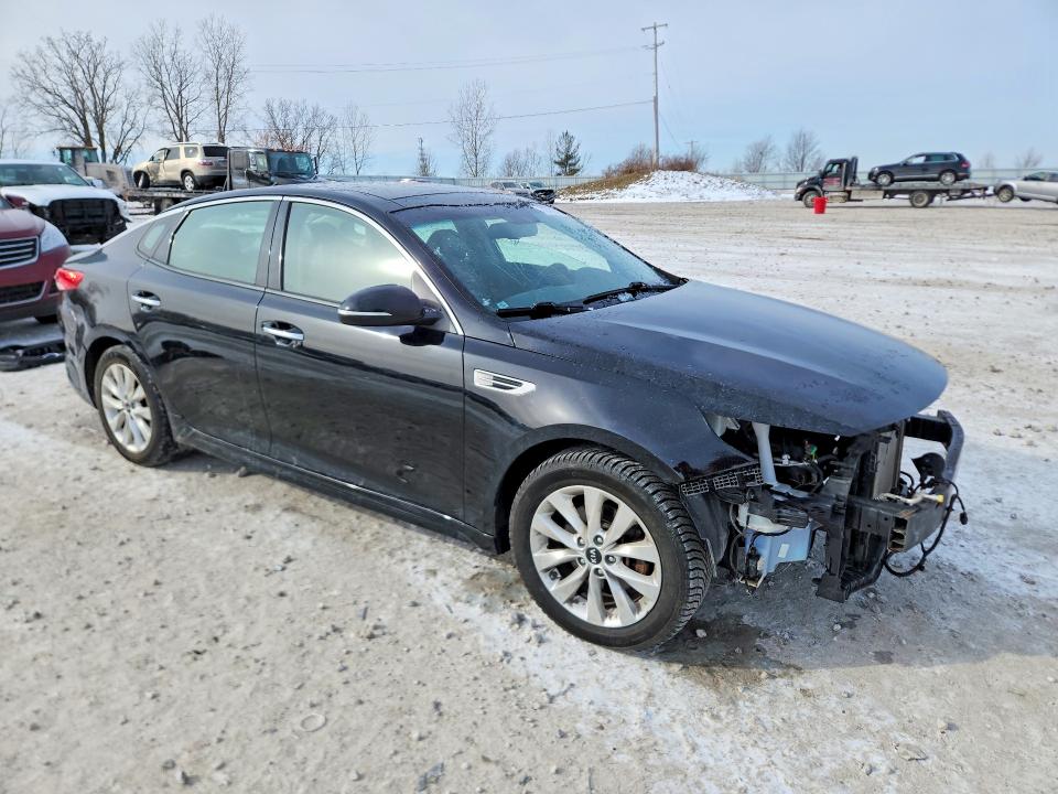 Photo 4 from auction – 2016 KIA OPTIMA with VIN 5XXGU4L3XGG081517