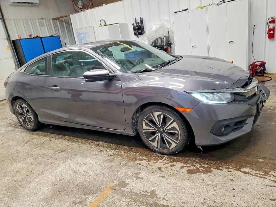 Photo 4 from auction – 2016 HONDA CIVIC with VIN 2HGFC3B32GH355298