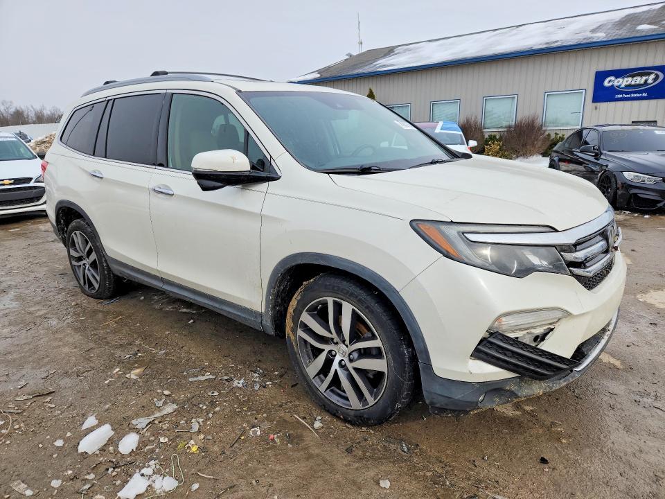Photo 4 from auction – 2017 HONDA PILOT with VIN 5FNYF5H97HB015495